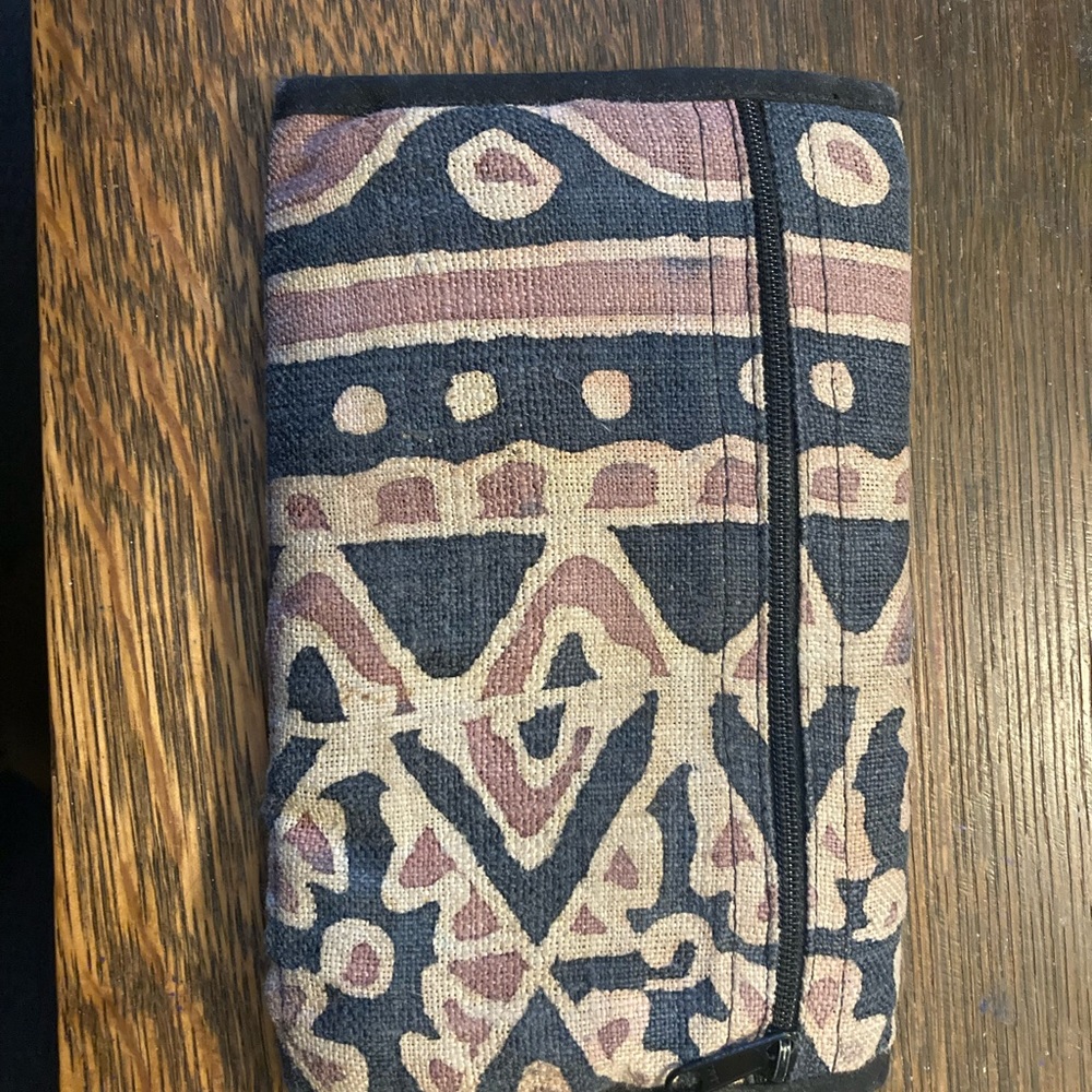 patterned tri fold wallet! Lots of room for cash + cards with a Velcro close